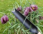 Close-up of the hardened boron steel blade of the DeWit Snake Tongue Trowel, showcasing its durability as a garden tool.